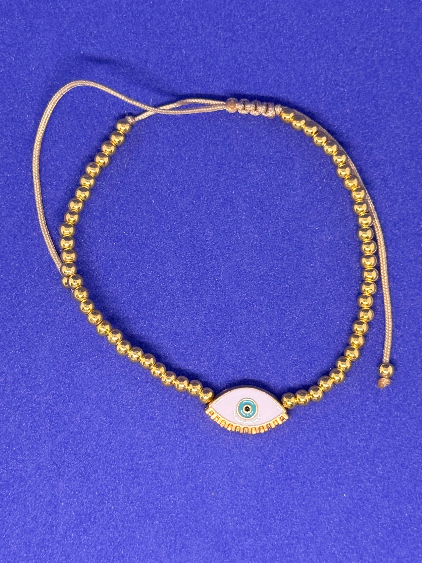 Evil eye string bracelet