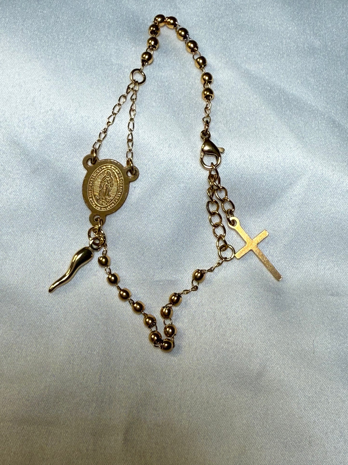 Delicate Rosary bead bracelet with gold colored Italian horn