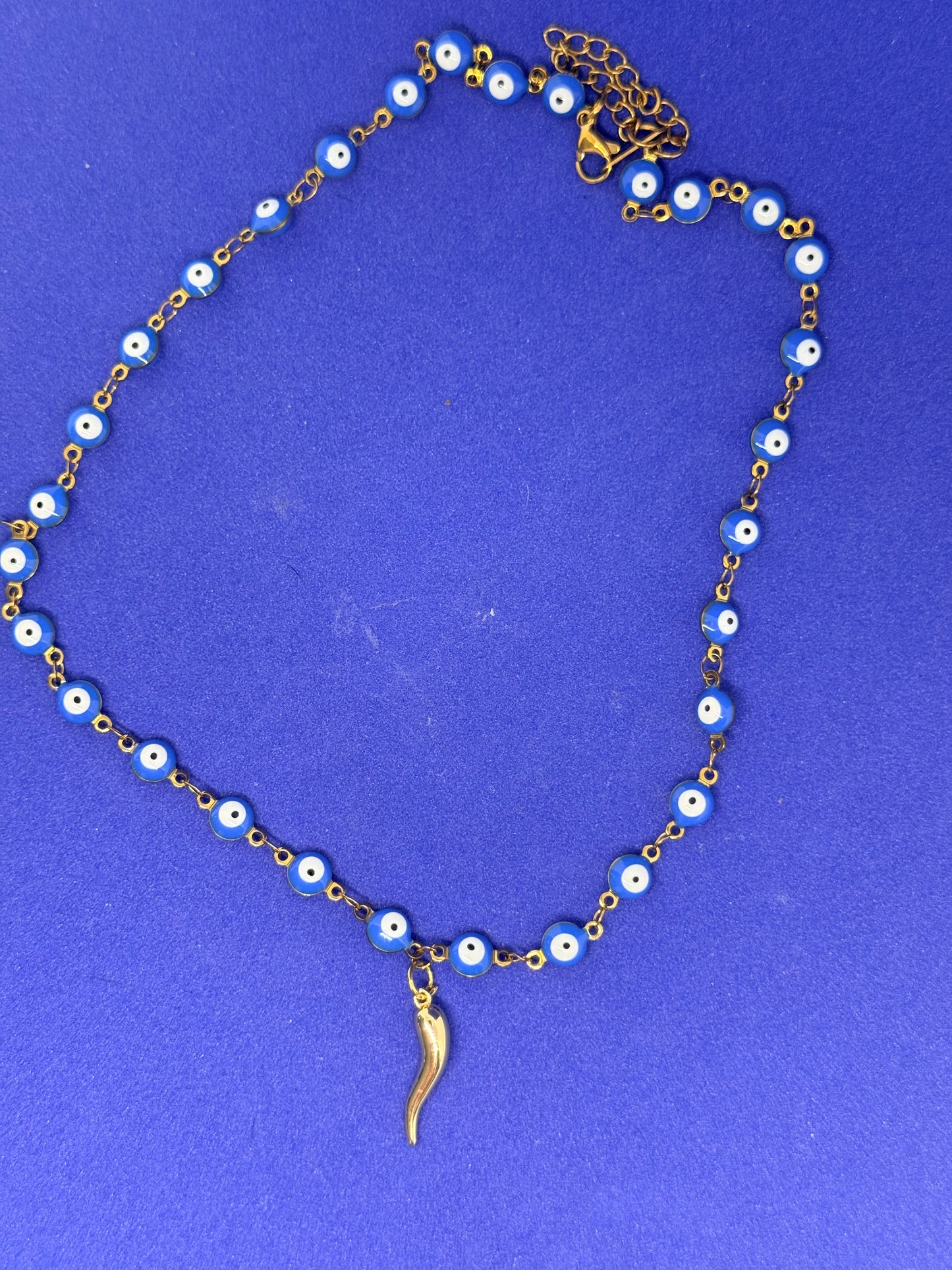 Evil eye necklace with Italian horn