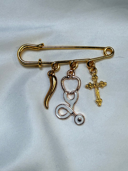 Stethoscope with Italian horn and gold colored cross