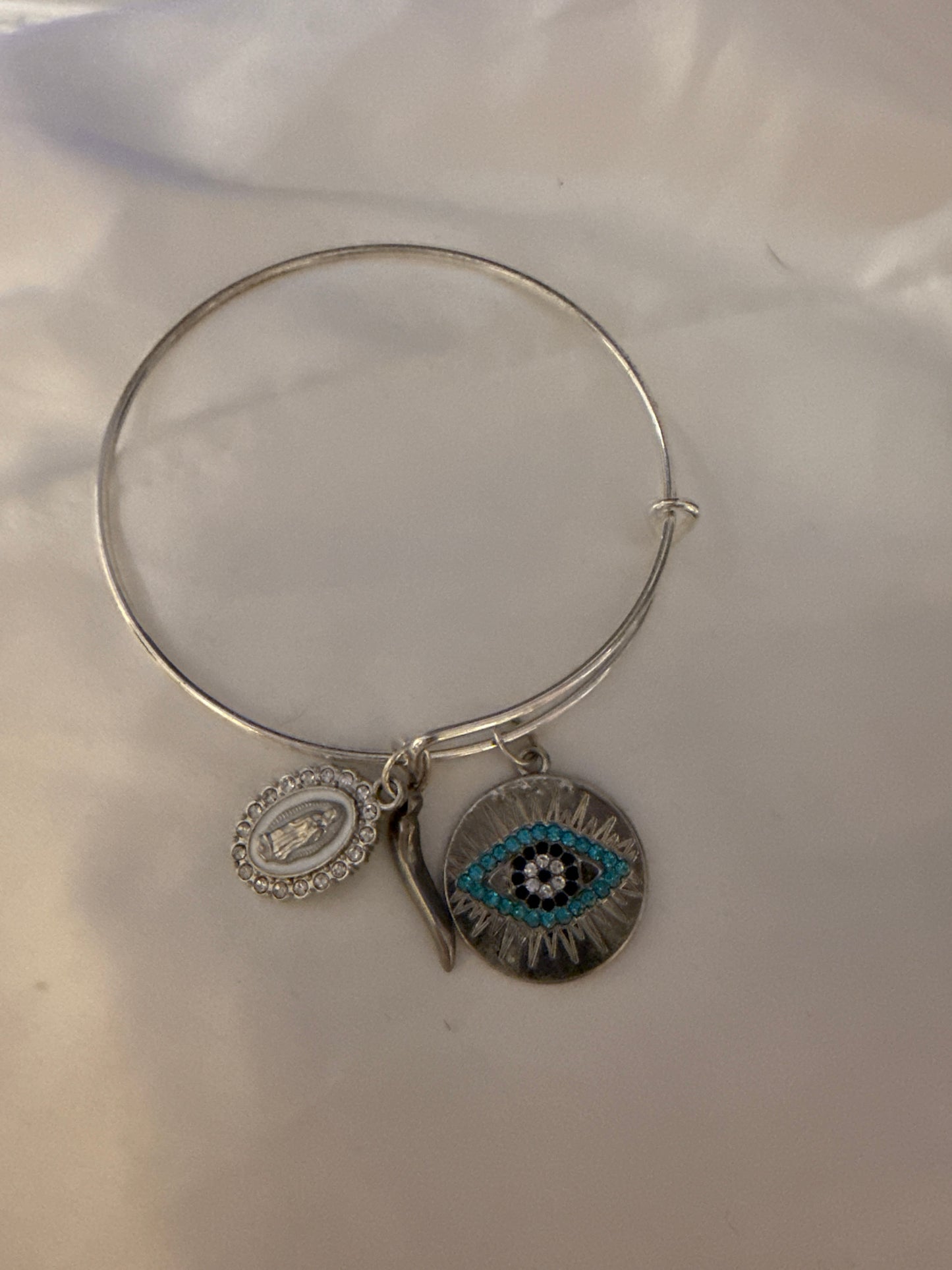 Silver evil eye horn blessed mother