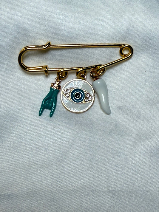 Evil eye with turquoise italian hand and and white horn