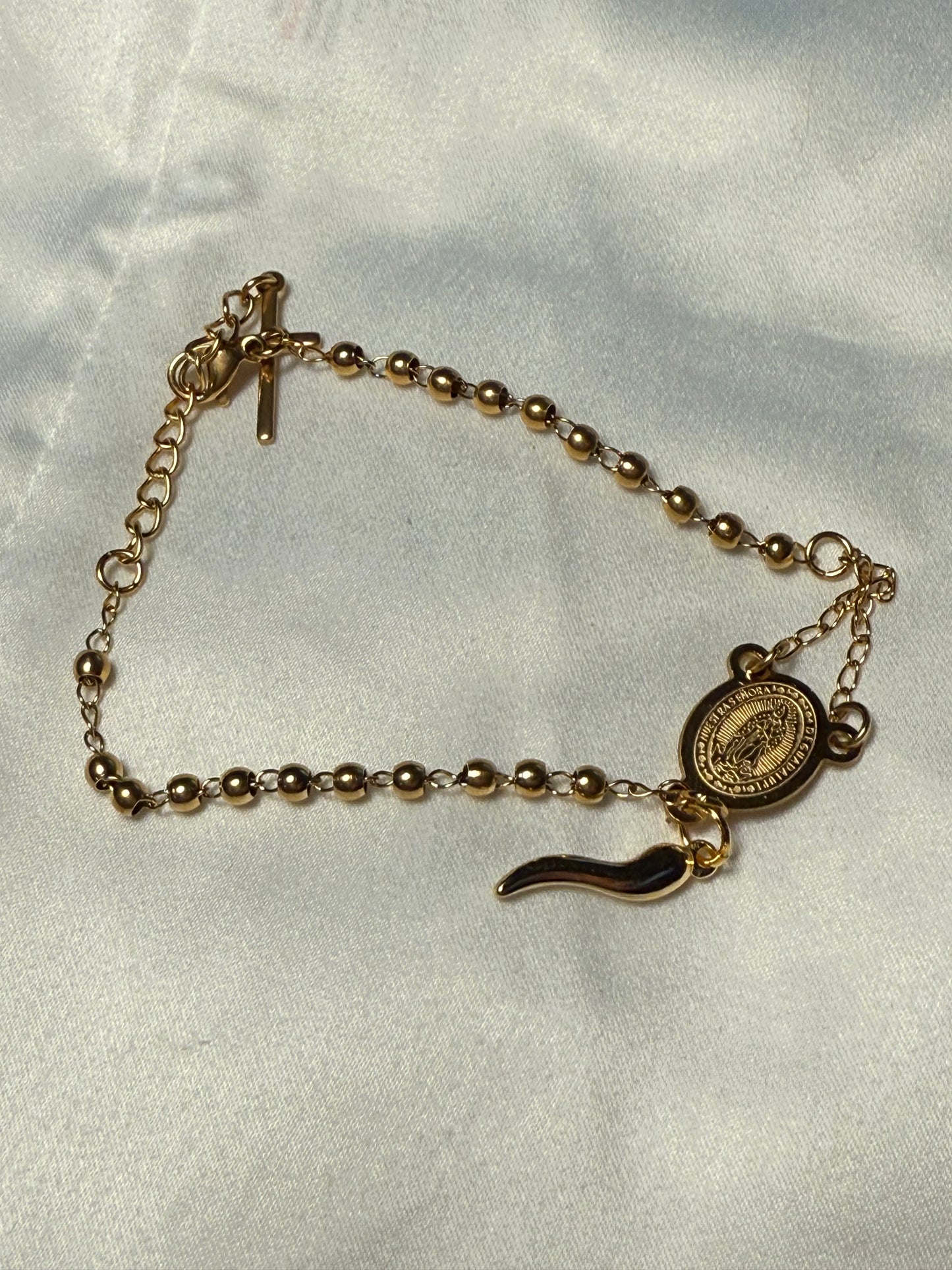 Gold colored car rosary/bracelet