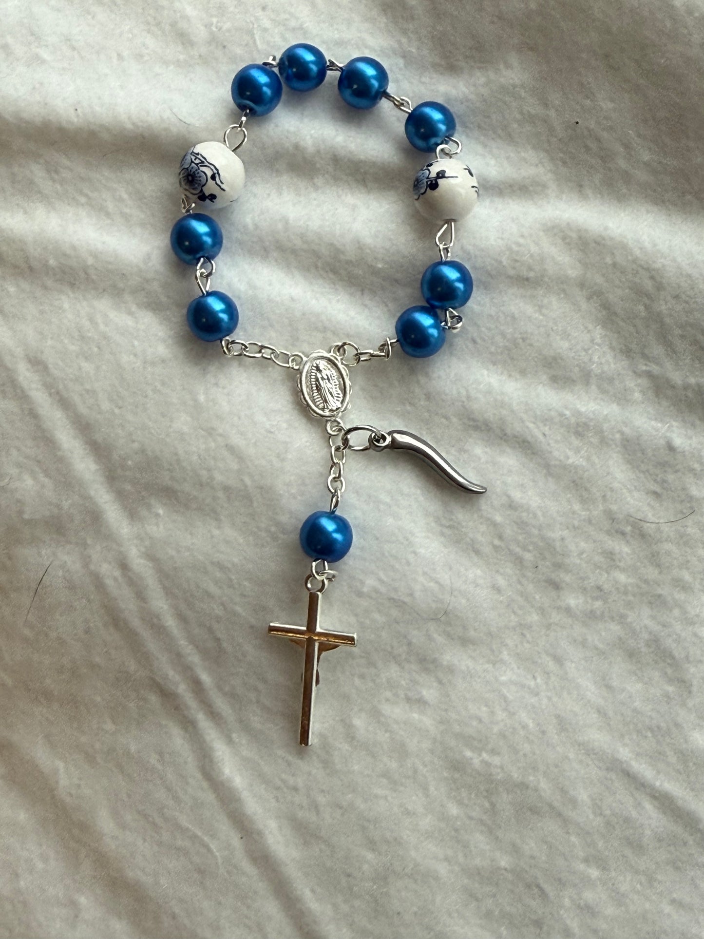 Blue Car rosary with the ceramic floral bead with a Italian horn