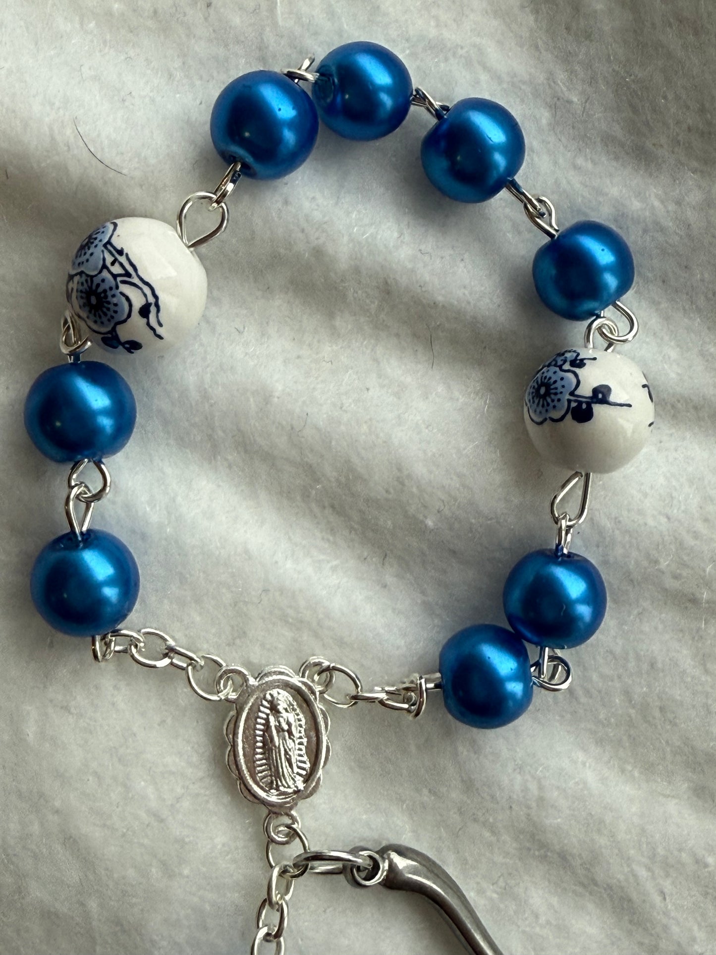 Blue Car rosary with the ceramic floral bead with a Italian horn