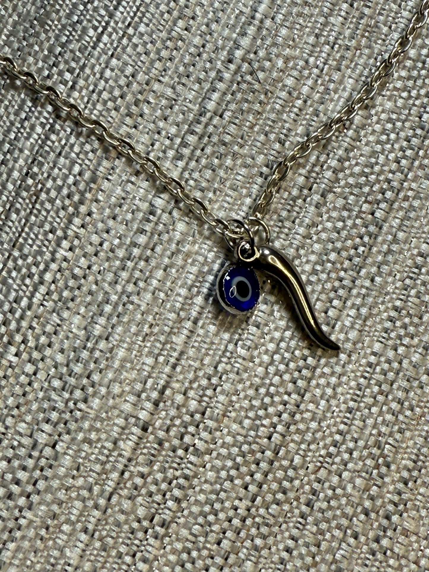 Silver necklace with Italian silver horn and evil eye